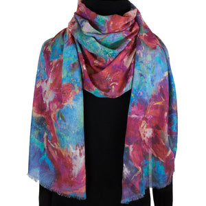 Long cashmere-silk scarf with floral design by Oksana Fine Art and Design, based on an impressionist painting of red orchids with a green and turquoise background, worn over a black sweater, 3. 210x70 cm, 82x27 inches