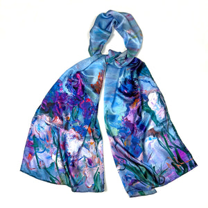 Long silk scarf tied as flat lay, with irises and water lilies on a colorful background, Graceful Irises, from Oksana Fine Art and Design