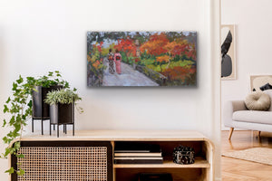Original oil painting by Oksana Johnson of two women in traditional Japanese kimonos walking in an ornamental park with autumn leaves and other fall foliage. On a white wall above a cabinet, next to door into another room with furniture.