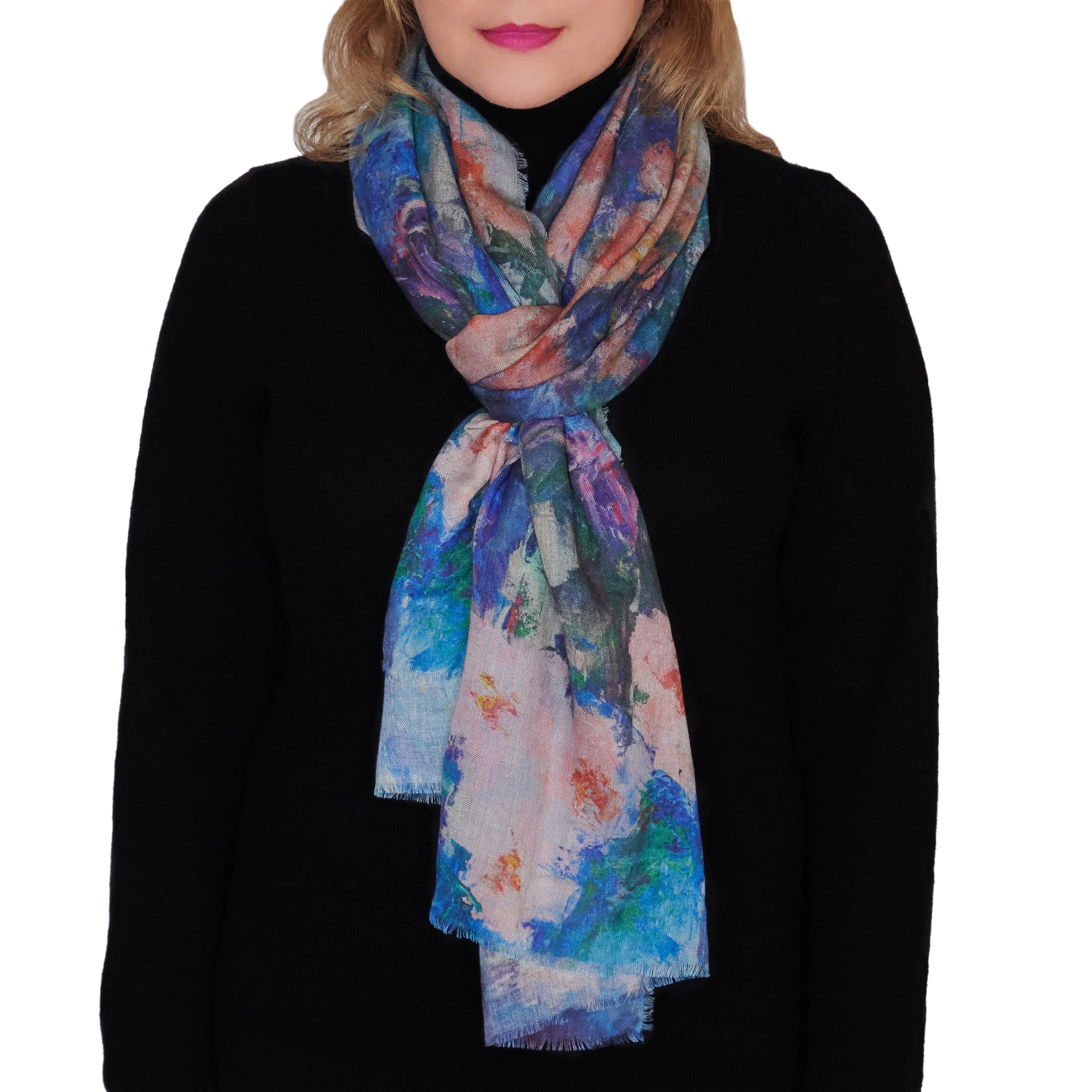 Long cashmere-silk scarf with floral design by Oksana Fine Art and Design, based on an original impressionist painting of pink orchids with a light green and blue background, worn over a black sweater, 210x70 cm, 82x27 inches