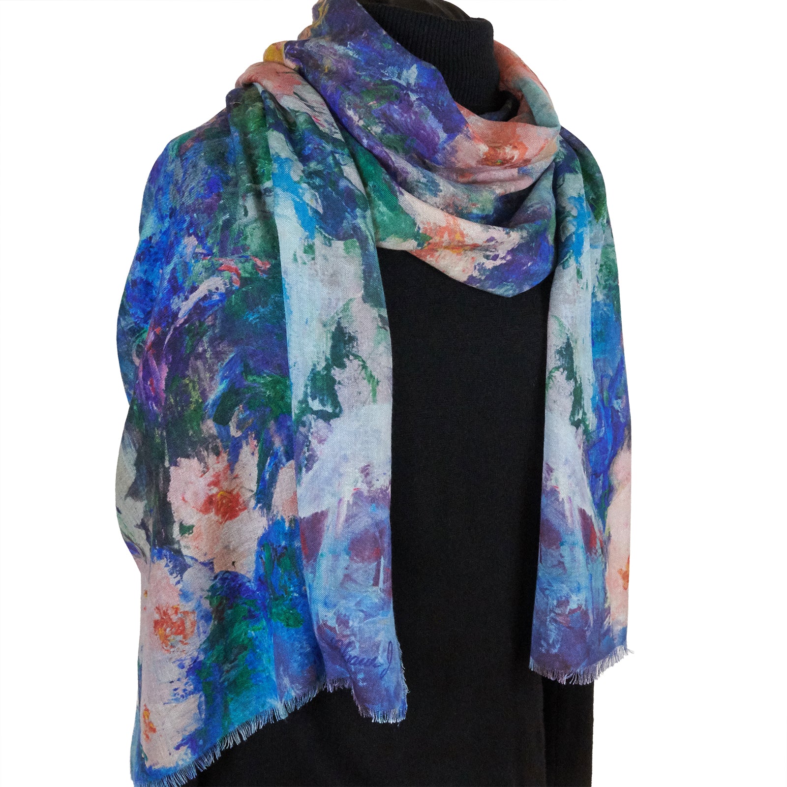Long cashmere-silk scarf with floral design by Oksana Fine Art and Design, based on an original impressionist painting of pink orchids with a light green and blue background, worn over a black sweater, 210x70 cm, 82x27 inches