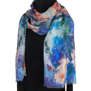 Long cashmere-silk scarf with floral design by Oksana Fine Art and Design, based on an impressionist painting of pink orchids with a light green and blue background, worn over a black sweater, 3. 210x70 cm, 82x27 inches